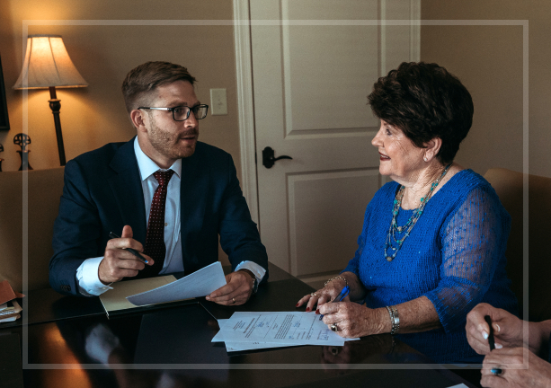 geiger legal group attorney with client