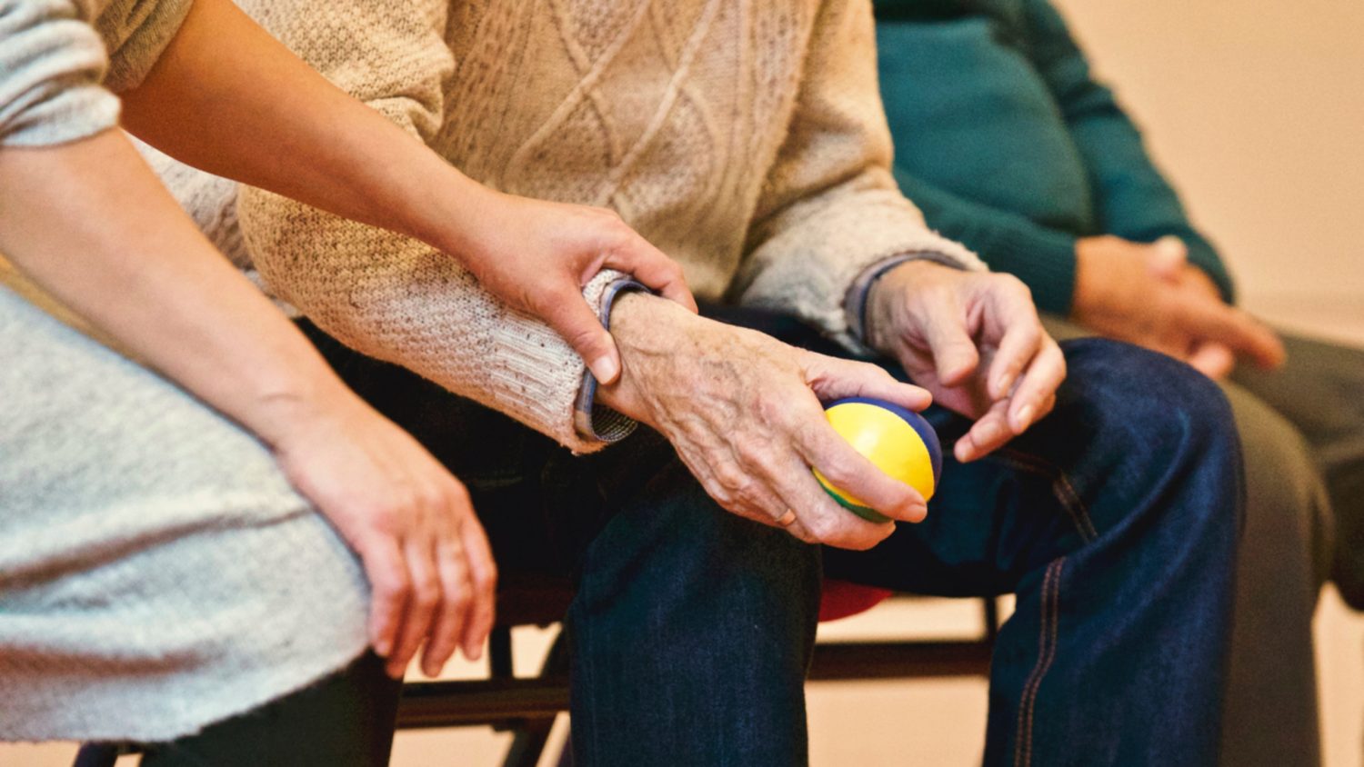 Elderly man in a Georgia nursing home doing physical therapy