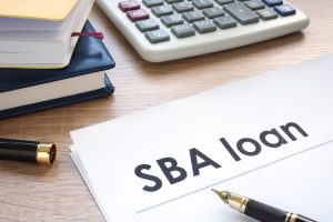 calculator and sba loan paper