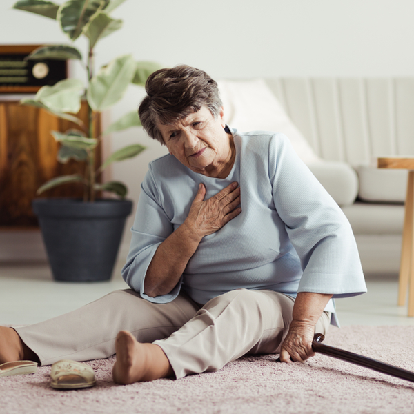 disabled elder lady sitting on floor