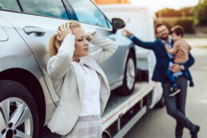 An agitated family in Georgia wait after a car accident with an uninsured motorist