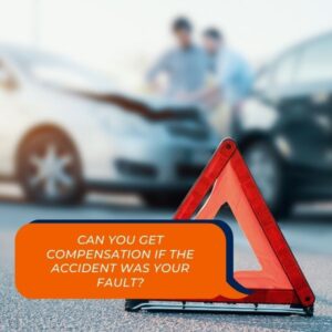 Warning triangle with people talking in the back after car accident