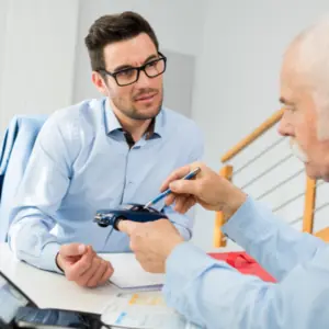 client with neck braces talking to a lawyer about car accident in Woodstock, GA